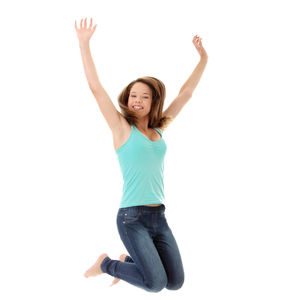 Portrait of a young woman against white background