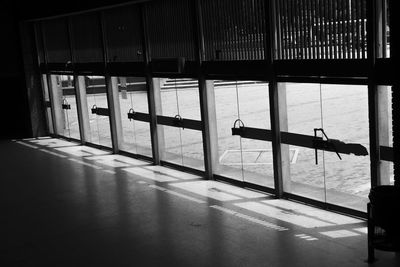 Shadow of person on glass window of building