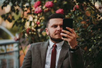 Young man using mobile phone