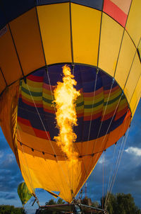 Low angle view of hot air balloon against sky