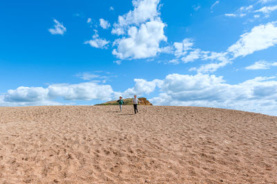 Scenic view of desert against sky