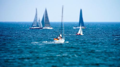 Boats sailing in sea