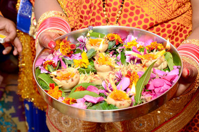 Close-up of various flowers in bowl
