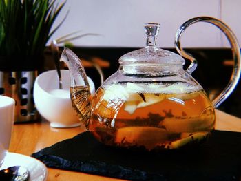 Close-up of drink in glass jar on table