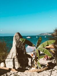 Scenic view of sea against clear blue sky