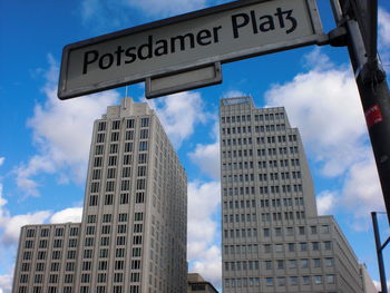 Low angle view of skyscrapers against sky