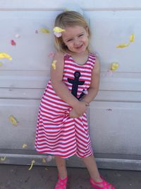 Happy girl playing with umbrella