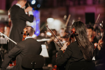 People playing in music concert