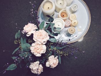 High angle view of white flowers on table