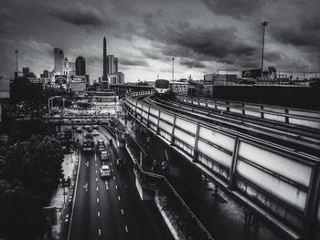 High angle view of train in city against sky