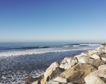 Scenic view of sea against clear sky