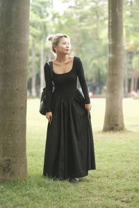 Low section of man with arms raised