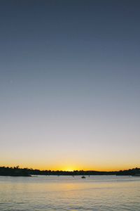 Scenic view of beach against sky during sunset