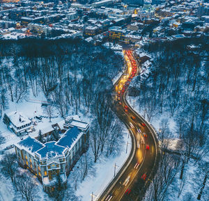 High angle view of snow in city during winter