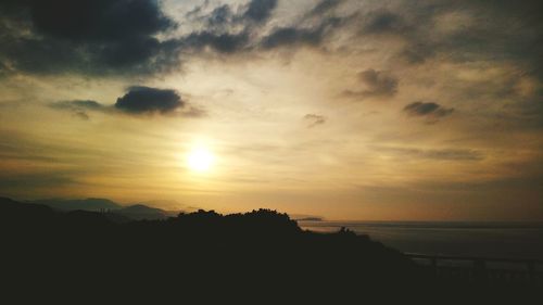 Scenic view of sea at sunset