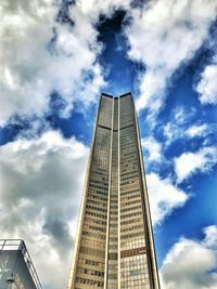 Low angle view of modern building against sky