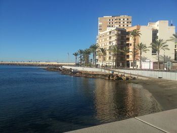 View of buildings against clear sky