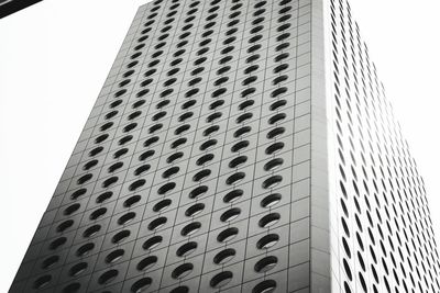 Low angle view of modern building against sky in city