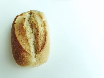 High angle view of bread against white background