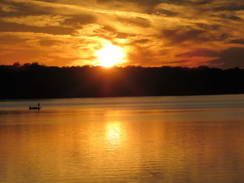Scenic view of sunset over sea
