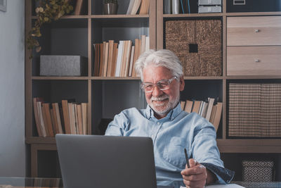 Portrait of man using mobile phone