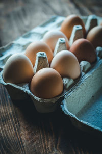 High angle view of eggs in container on table