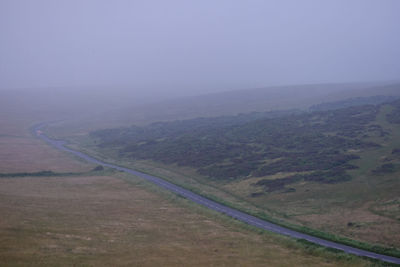 High angle view of road amidst landscape against sky