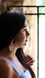 Portrait of young woman looking away