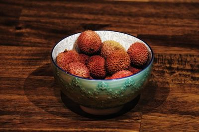 High angle view of fruits in bowl on table