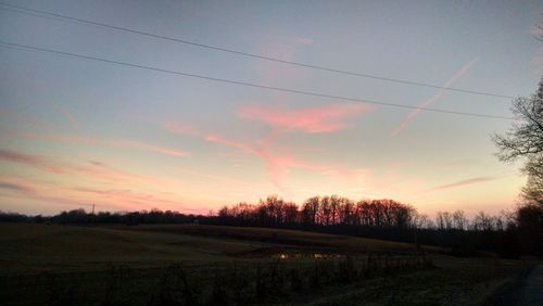 Scenic view of landscape at sunset