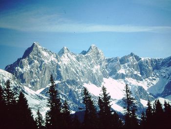 Scenic view of snowcapped mountains against sky