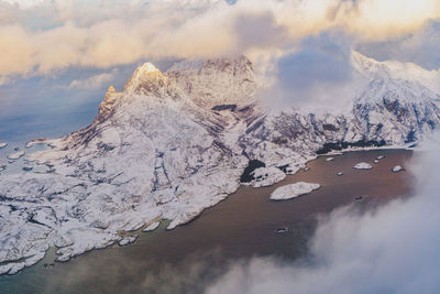 Scenic view of frozen lake against sky