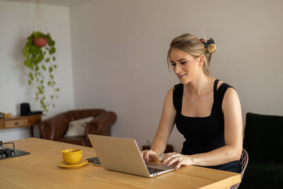 Woman working at home with laptop. home office.  notebook for working. 