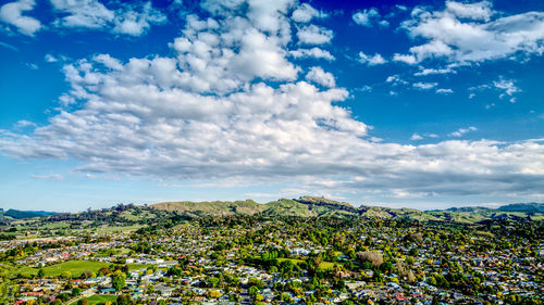 Scenic view of landscape against blue sky