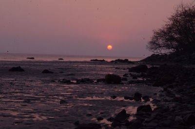 Scenic view of silhouette landscape against sky during sunset