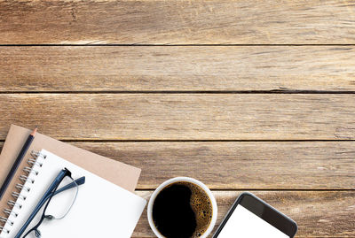 High angle view of coffee cup on table