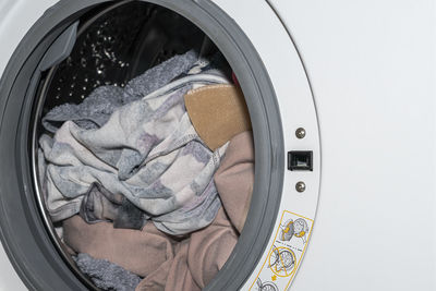 Washing machine close - up as background