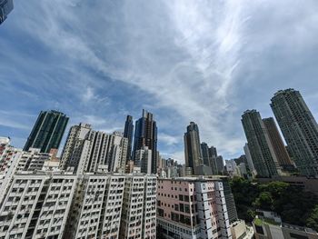 Low angle view of modern buildings against sky