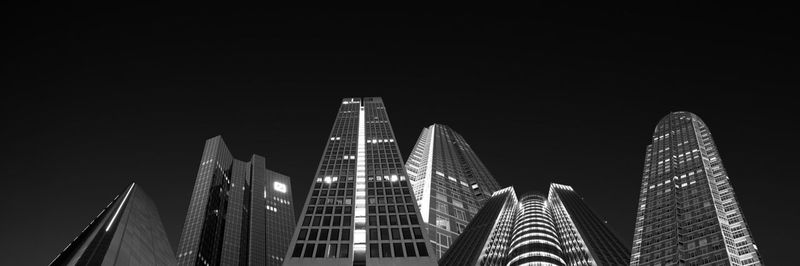 Low angle view of modern building at night