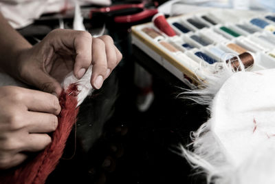 Cropped image of person working indoors