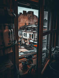 Buildings seen through glass window