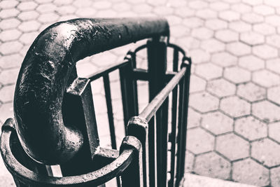 Close-up of railing against wall