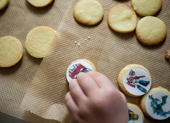 Low section of woman standing on tiled floor