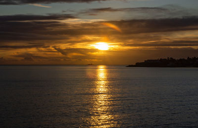 Scenic view of sea against sky during sunset