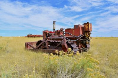 Rusting machinery in field