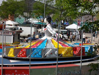 Low angle view of carousel in amusement park