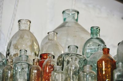 Close-up of old bottles