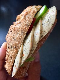 Close-up of hand holding bread