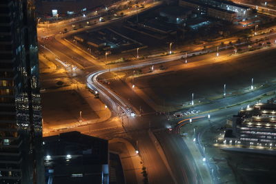 High angle view of light trails on road at night