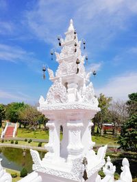 Statue of temple against sky